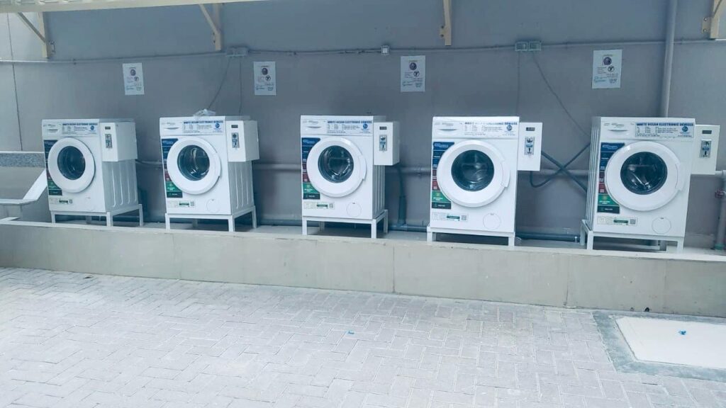 COIN OPERTAED WASHING MACHINES